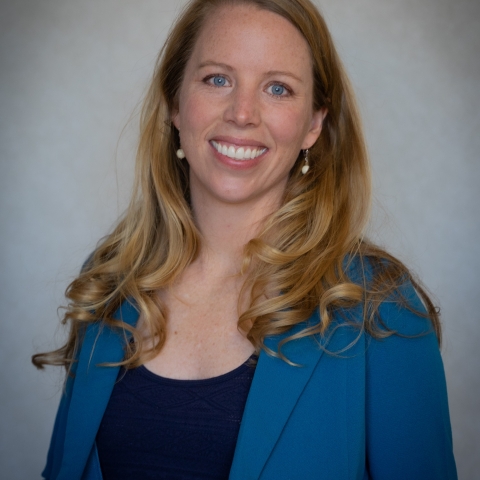 Alison Stewart smiles in a portrait headshot