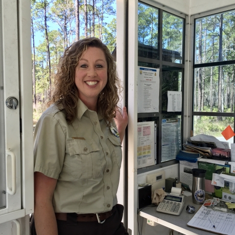 Valerie in an entrance booth