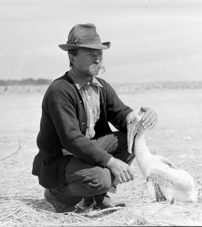 man (Paul Kroegel) kneeling