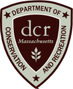 Shield-shaped logo that reads "Department of Conservation and Recreation dcr Massachusetts"