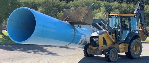 New water pipe being transported for installation at Makah National Fish Hatchery