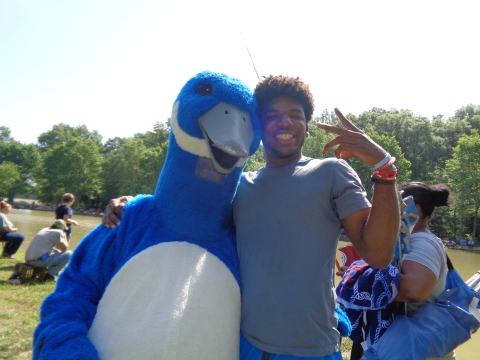 Blue Goose and an adult male smiling happily