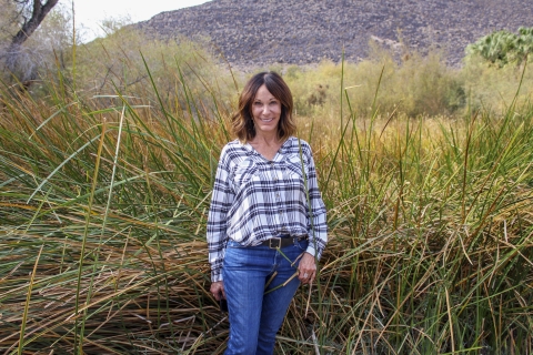 a woman standing outside 