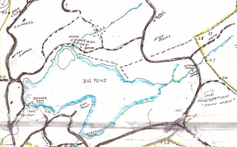 A hand-drawn map of walking trails around a pond