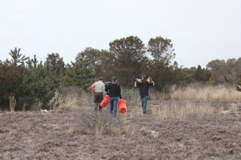 Team of biologists search for signs of predators on the refuge