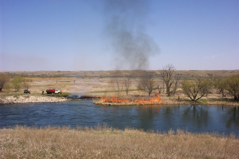 J. Clark Salyer National Wildlife Refuge staff implementing a prescribed burn on the Upper Souris