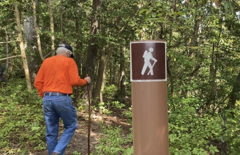 hiker with walking stick