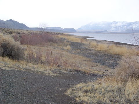 Shores of Hart Lake with snowy mountains in background