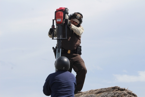 Wildlife Officer and Volunteer Install Sign Posts on the Dungeness Spit