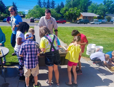 FWS staff works with summer school students.