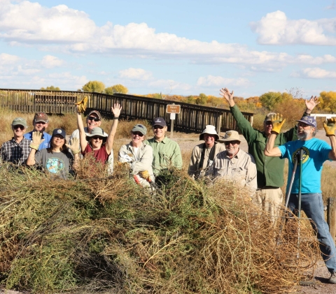 friends of Bosques with gloves and tools for clean up day