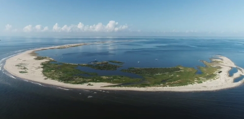 A ring-shaped offshore island after being widened and replenished during a major restoration.