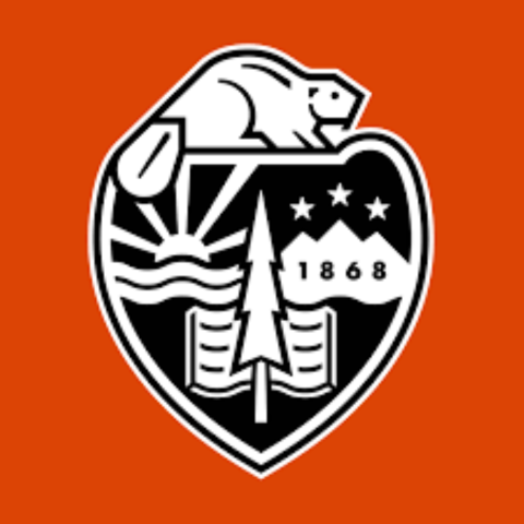 Shield logo for Oregon State University. Shield includes a tree, book, sun, beaver, and mountains with the text "1868."