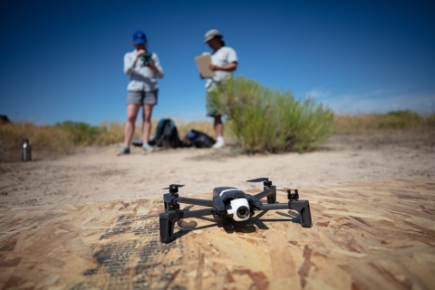 two employees and a drone