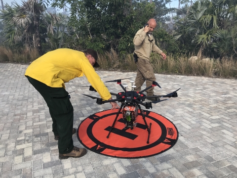 two employees and a drone