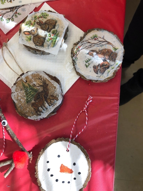 Wooden Christmas ornaments on a table