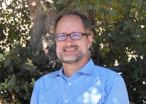 a portrait of Ryan Olah, a biologist with Sacramento Fish and Wildlife Office