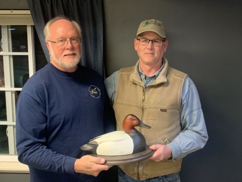 Tom Cooper awarding Dr. Jim Dubosky International Canvasback Award Trophy