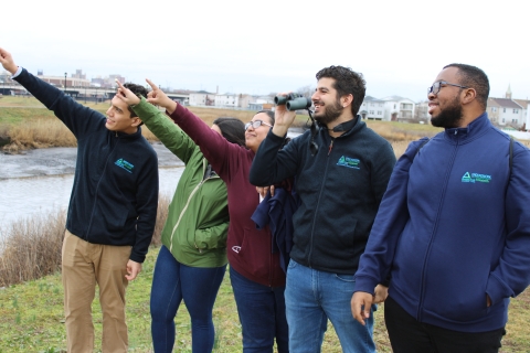 Participants in the Elizabeth Urban Wildlife Refuge Partnership Great Backyard Bird Count look for birds along the Elizabeth River