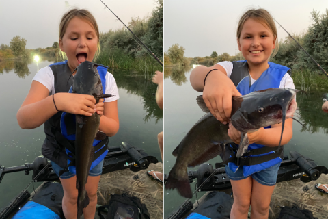 Two side by side photos of a girl wearing a blue life vest, smiling and holding a fish. In one photo, she appears to be about to eat or kiss the fish. She stands in a raft in water.