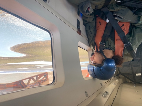 person looking out the wind of an airplane