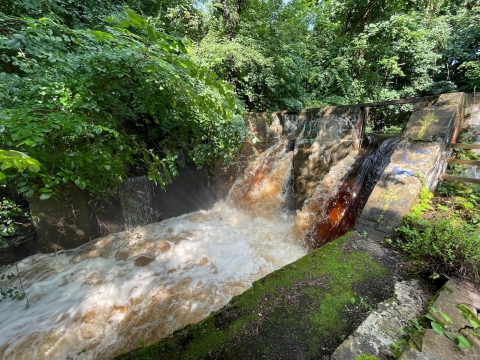 The High Street Dam with water flowing over the top