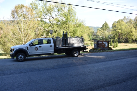 Eastern Band of Cherokee Indians distribution truck parked at the entrance of Erwin National Fish Hatchery