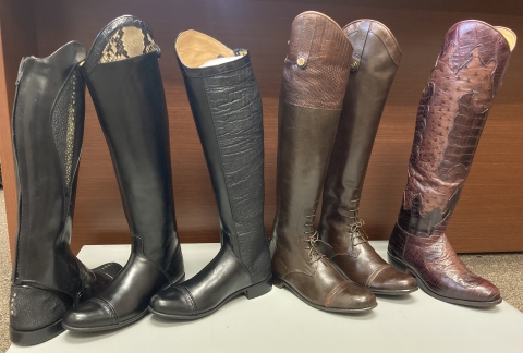 Display of boots that made from and trimmed with protected species such as elephant, python, and crocodile..