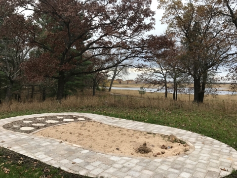 Sand animal tracking pad shaped like a bear's paw