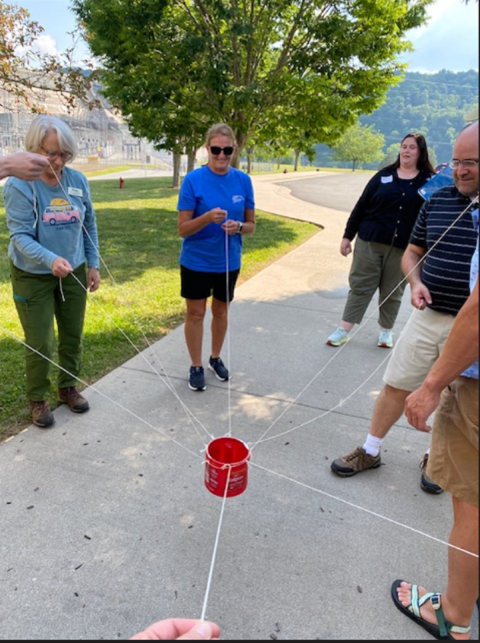 Workshop participants doing a water activity 