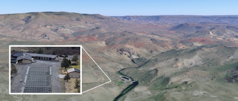 A landscape image of a valley with an arrow pointing to the location of a hatchery deep in the valley. There is a zoomed in photo in the photo showing a close up of the hatchery.