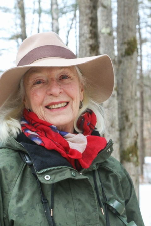 woman smiles at the camera