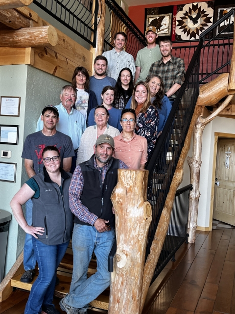 Photo of the North Dakota & South Dakota Ecological Services team members standing on a staircase.