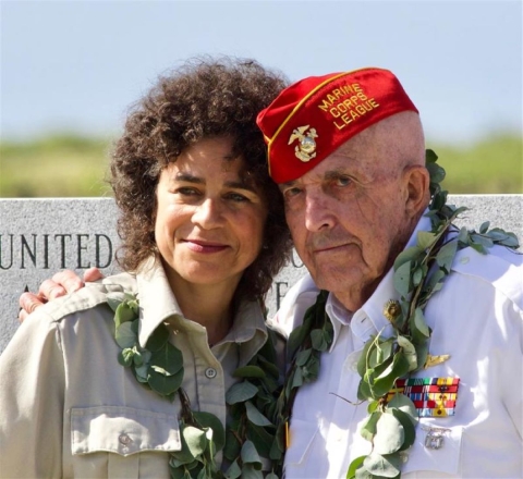 Sergeant Edgar R. Fox and Rebecca Chuck smile at Midway Atoll memorial