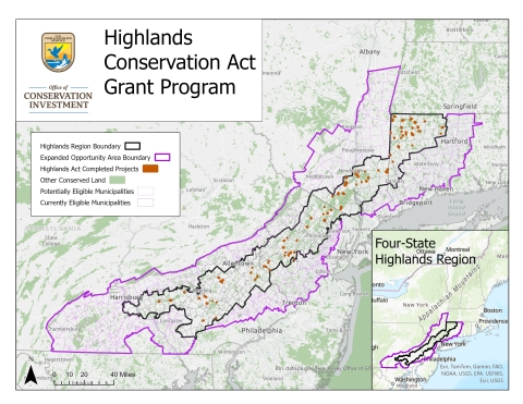 This map, titled Highlands Conservation Act Grant Program, represents the completed land conservation projects, represented by orange polygons, in the four-state Highlands region that includes parts of Pennsylvania, New York, New Jersey, and Connecticut. In the left center of the map, a legend notes that the Highlands Region Boundary is represented with a black line, the Expanded Opportunity Area Boundary with a purple line, Completed Highlands Projects in solid orange, Other Conserved Land in solid green