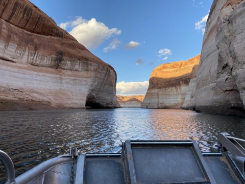 Photo taken from a boat on a river in a canyon