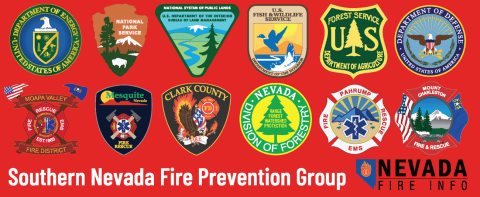 A red banner with the logos of 12 different local, state and federal wildland fire partner agencies. Text at the bottom of the banner reads: Southern Nevada Fire Prevention Group.