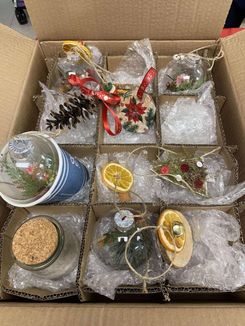 Various ornaments in a cardboard box