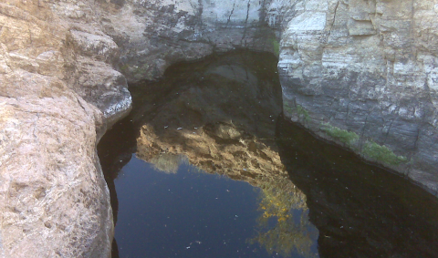 A body of water enclosed in rock