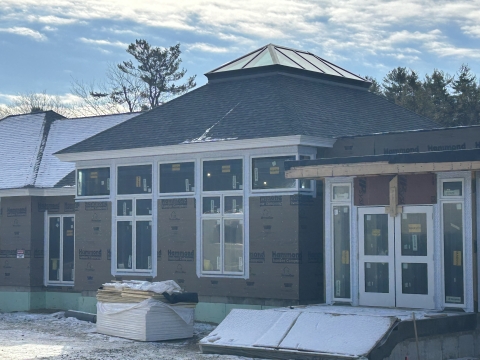 Multipurpose Facility Entrance with New Windows and Skylight