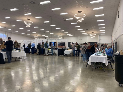 Exhibitors set up in conference room