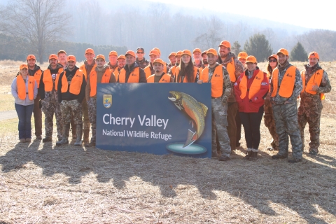 Participants in the Field to Fork mentored rifle deer hunt pose for a group photo at Cherry Valley National Wildlife Refuge in December 2024. 