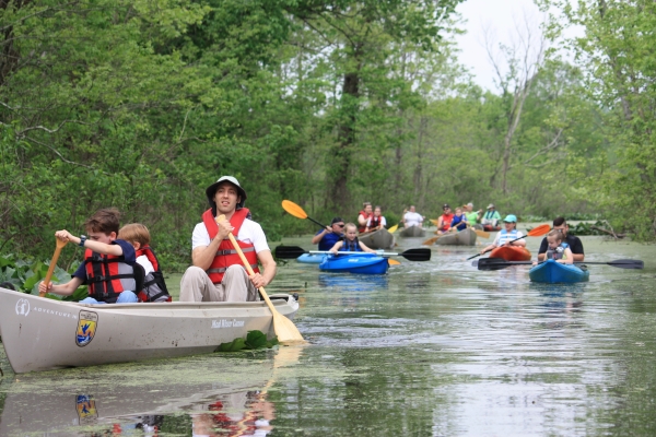 An image of a group of people on a canoe trip.