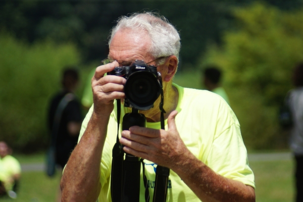 An image of a person taking a picture.