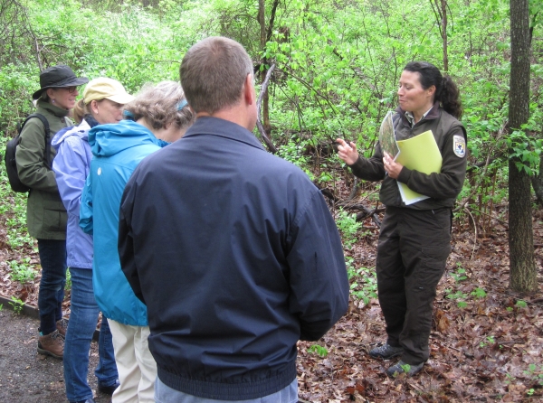 A refuge wildlife biologist leads as wildflower walk.