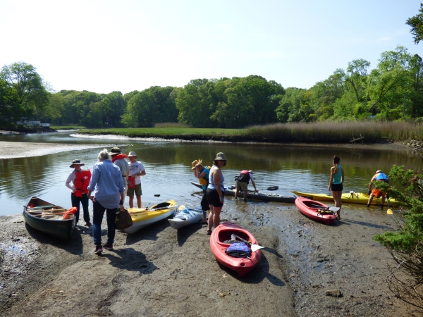 Kayakers get ready to paddle down the Menunketesuck River to see the refuge.