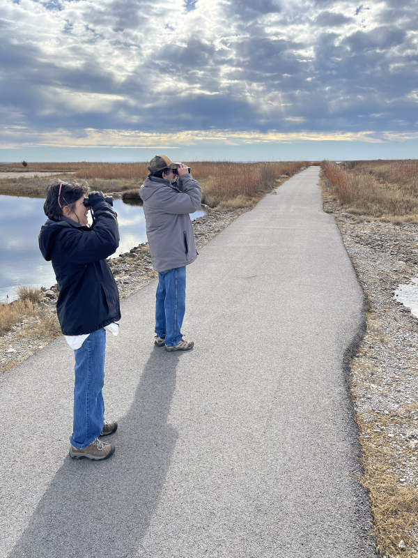 Two volunteers birding on sandpiper trail at Salt Plains National Wildlife Refuge.