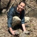 Evan Collins with three Wood Turtles