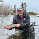 Charles Frady holding a cutthroat trout