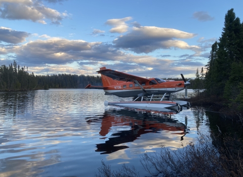 Survey aircraft parked on a lake